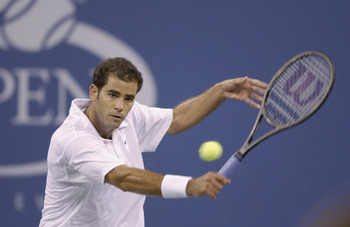 FLUSHING-SEPTEMBER 5: Pete Sampras (USA)hits a backhand against Andre Agassi (USA) during the US Open at the USTA National Tennis Center on September 5, 2001 in Flushing Meadows Corona Park in Flushing, New York. (Photo by Clive Brunskill/Getty Images)